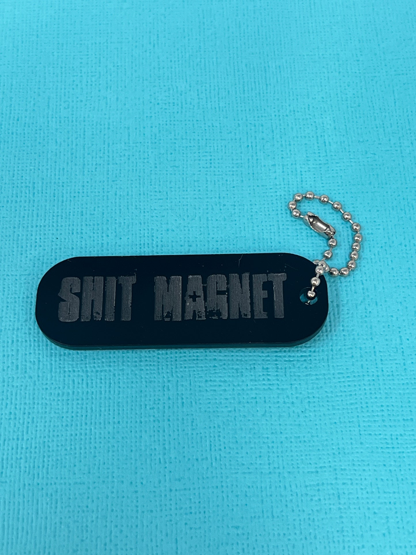 SHIT MAGNET - ACRYLIC KEYCHAIN